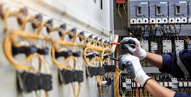 Professional Electrician technician working in Devens, MA